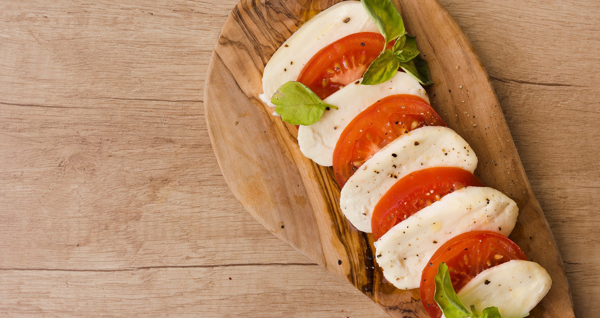 Roz's Caprese Salad with Grape Tomatoes, Mozzarella & Basil