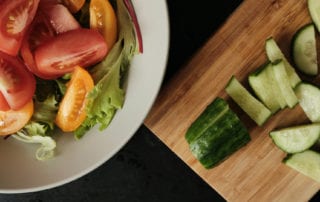 Cucumber salad being made