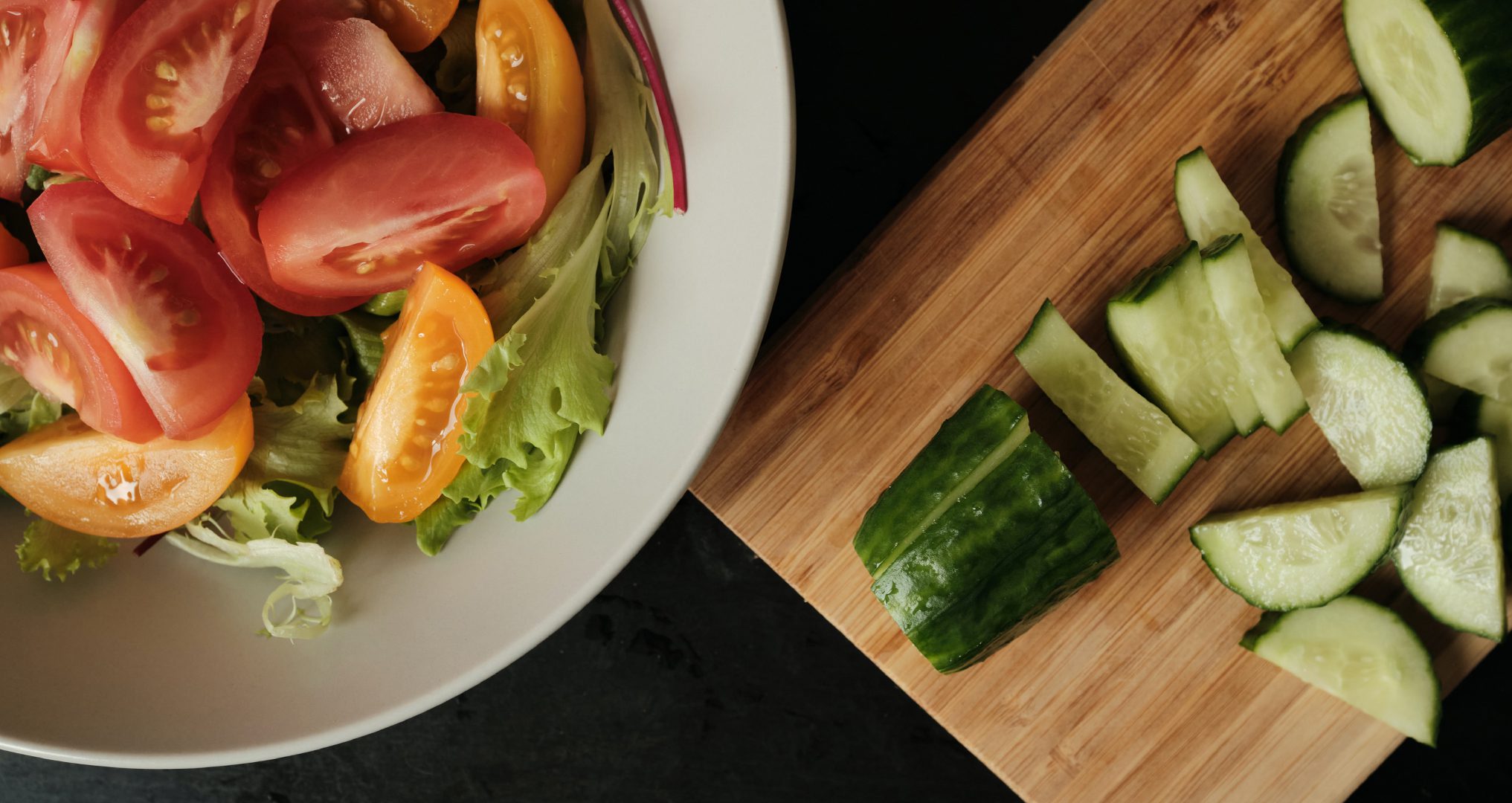 Cucumber salad being made